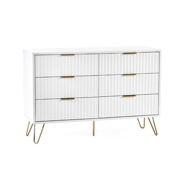 White dresser with gold accents on a white background