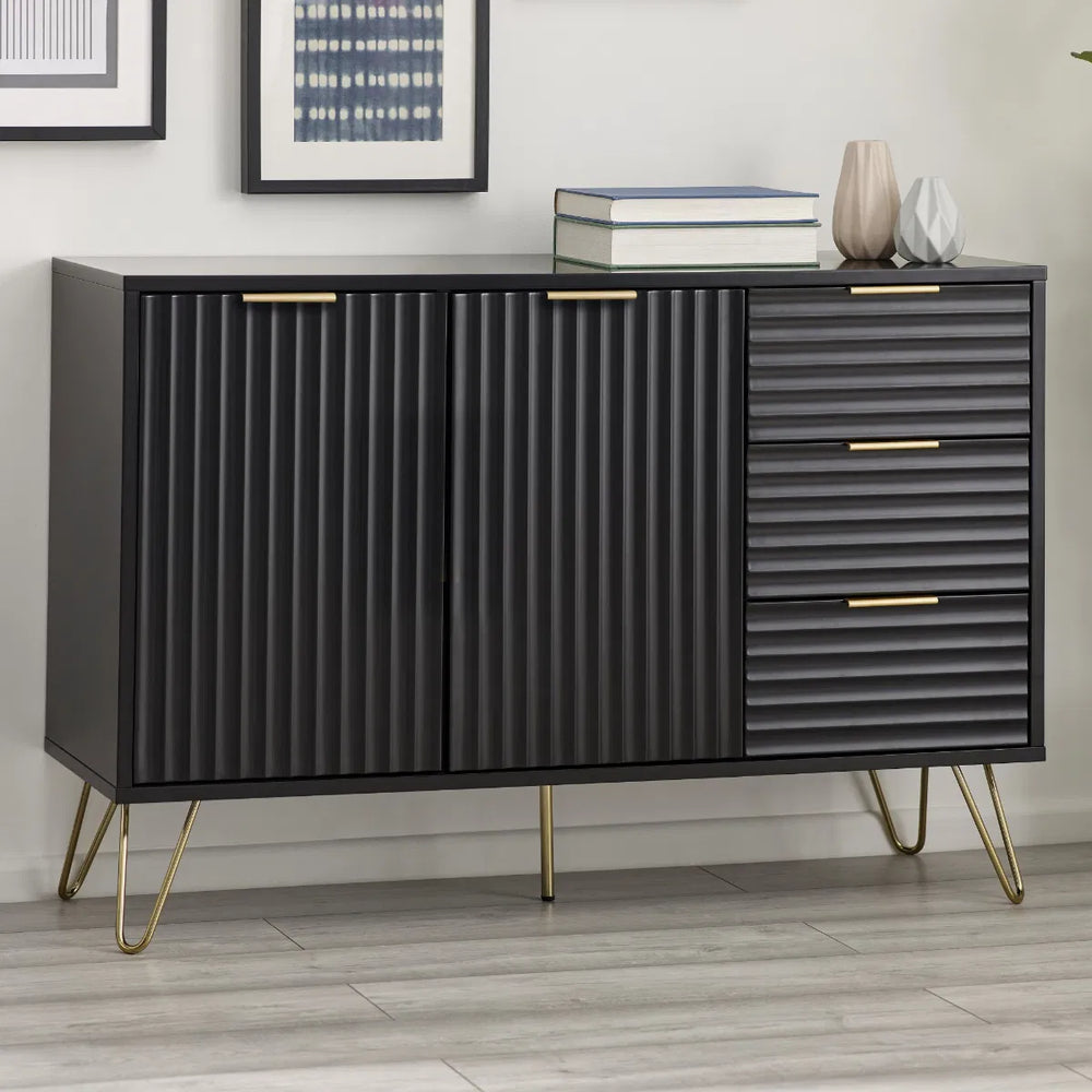 Modern black and white cabinet with ribbed doors and hairpin legs on a white background