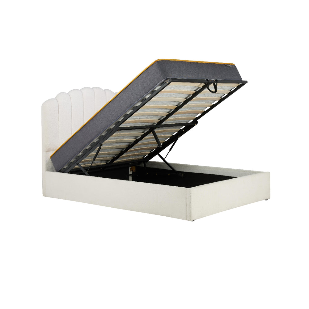 White upholstered bed with open storage compartment on a white background