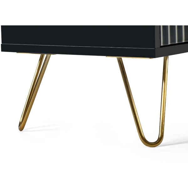 Black table with gold hairpin legs on a white background