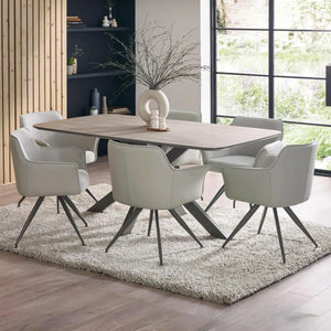 6 DINING CHAIRS AROUND A TABLE WITH A BIG WINDOW AND DECOR