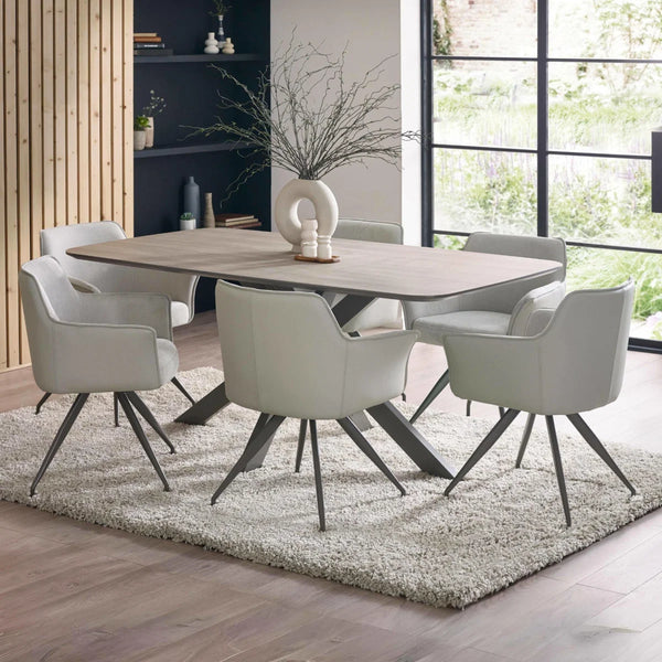 6 DINING CHAIRS AROUND A TABLE WITH A BIG WINDOW AND DECOR