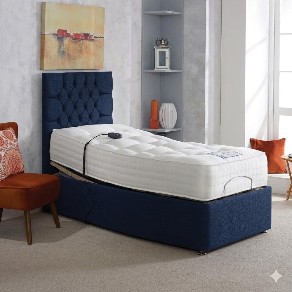 Bed with white mattress and navy upholstered headboard on a white background