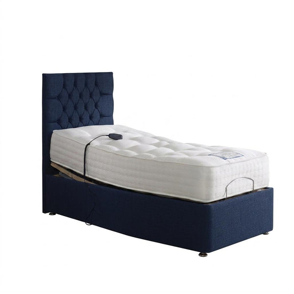 Bed with white mattress and navy upholstered headboard on a white background