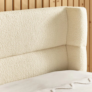 Cream boucle bed detail showing fabric detail