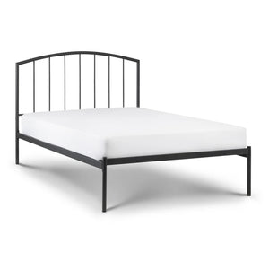 Black metal bed frame with white mattress on a white background