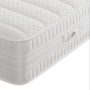 White mattress with brand logo on a white background