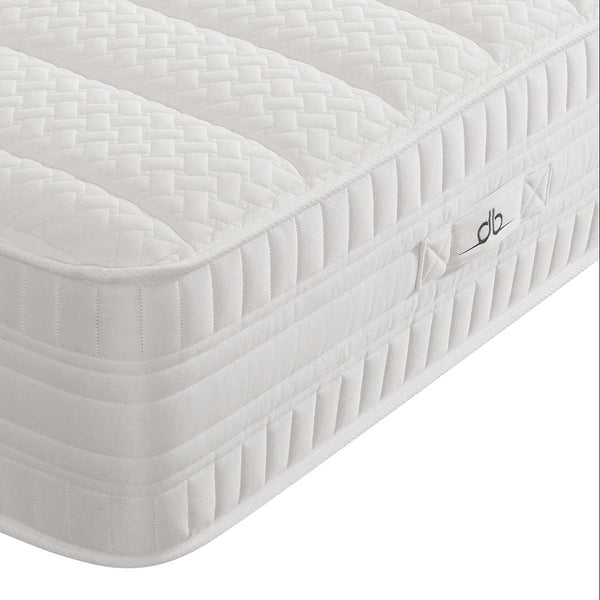White mattress with brand logo on a white background
