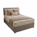 A bed with an upholstered headboard and base in taupe fabric, dressed with a quilted beige mattress, matching beige pillows, and a taupe throw blanket, shown on a plain white background.