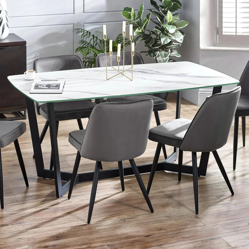 marble table with black metal legs on a white background