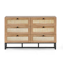 Wooden dresser with woven accents on a white background