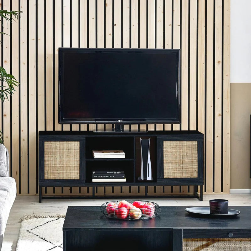Black entertainment console with wicker doors on a white background
