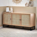 Wooden sideboard with wicker doors in a room setting