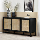 Black sideboard with woven doors in a room with decorative items.