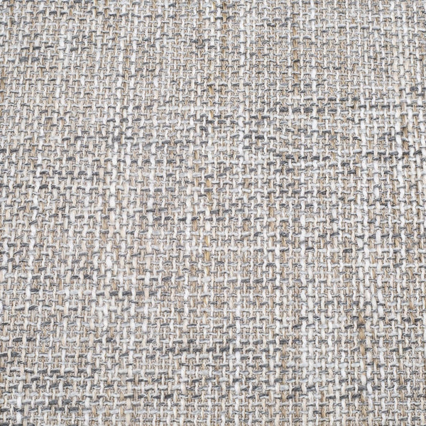 Close-up of a textured beige fabric surface