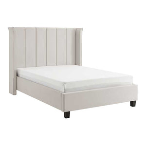 Beige upholstered bed with white mattress on a white background