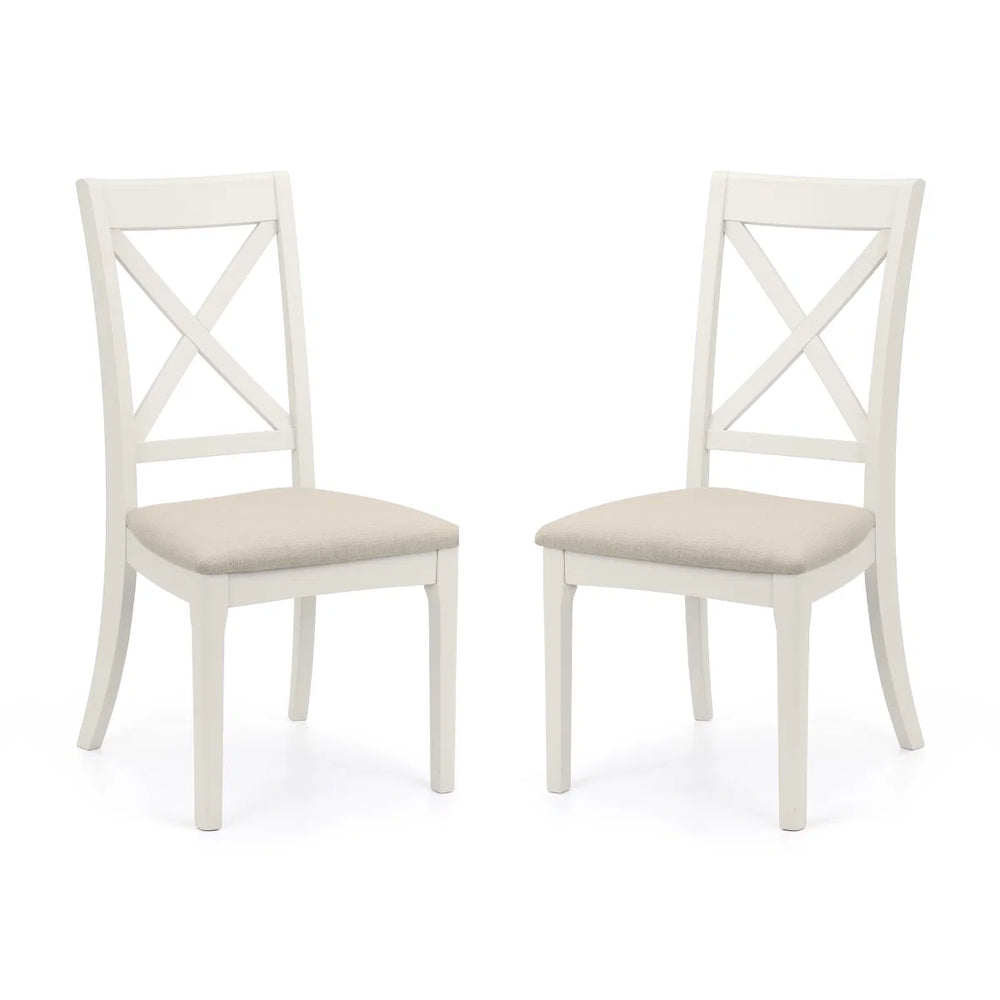 Two white chairs with beige seats on a white background