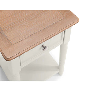 Wooden side table with a white base on a white background