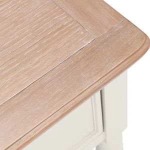 Wooden surface of a table with a white base on a white background