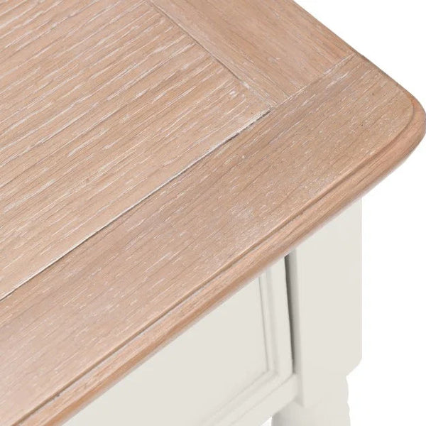 Wooden surface of a table with a white base on a white background