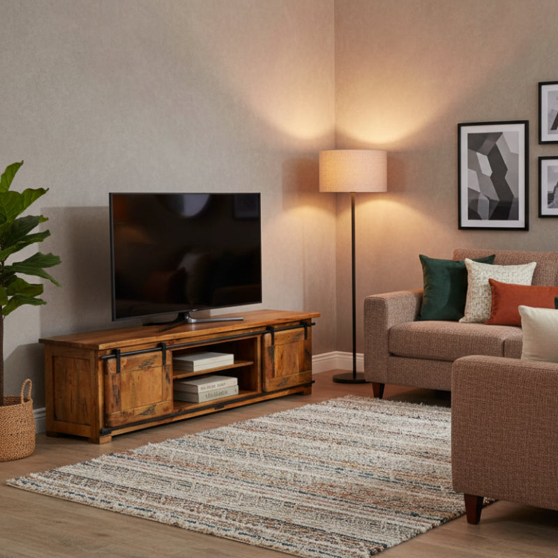 Wooden TV stand with metal accents on a white background