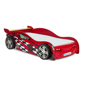 Red car-shaped bed with checkered pattern on a white background