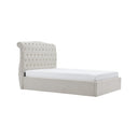 Light gray upholstered bed with tufted headboard on a white background