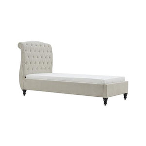 Beige upholstered bed with tufted headboard on a white background