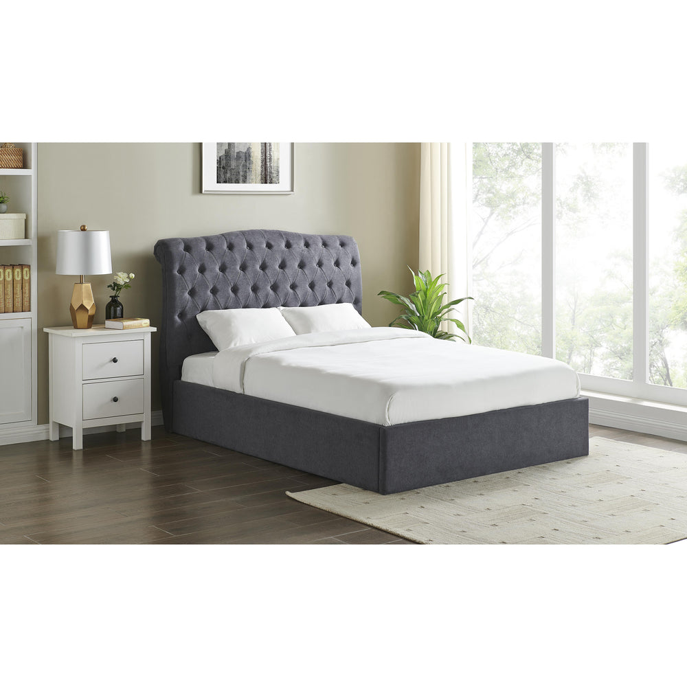 Gray upholstered bed with tufted headboard on a white background