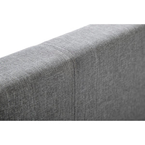 Close-up of a gray fabric surface with a subtle pattern