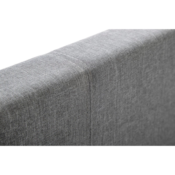 Close-up of a gray fabric surface with a subtle pattern