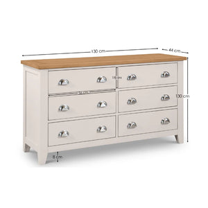 White dresser with wooden top and dimensions on a white background