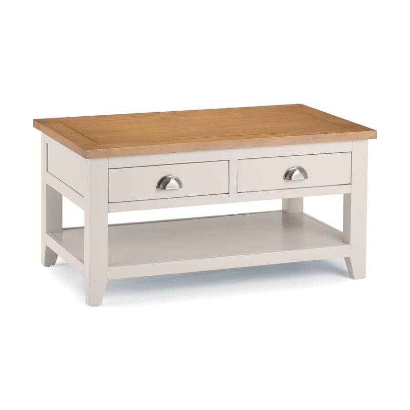 Wooden coffee table with two drawers on a white background