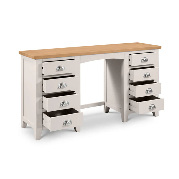 White desk with multiple drawers and a wooden top on a white background