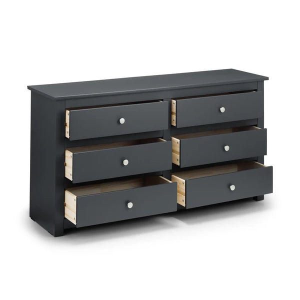 Dark gray dresser with six drawers on a white background