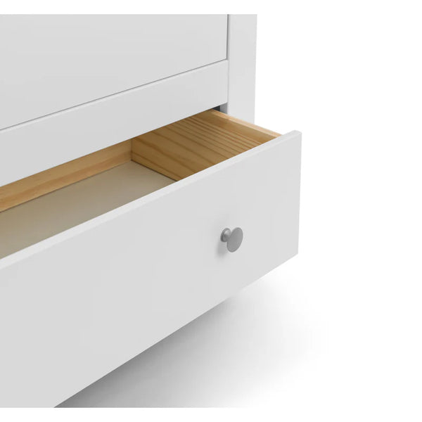 White drawer with wooden bottom and silver handle on a white background