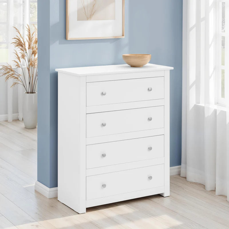 White dresser with four drawers on a white background