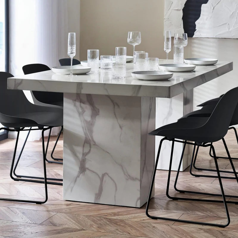 Marble-textured dining table on a white background