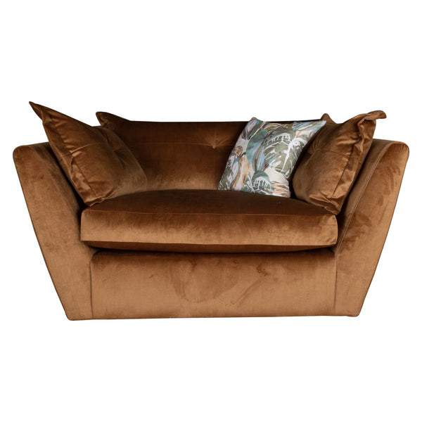 Brown sofa with decorative pillows on a white background