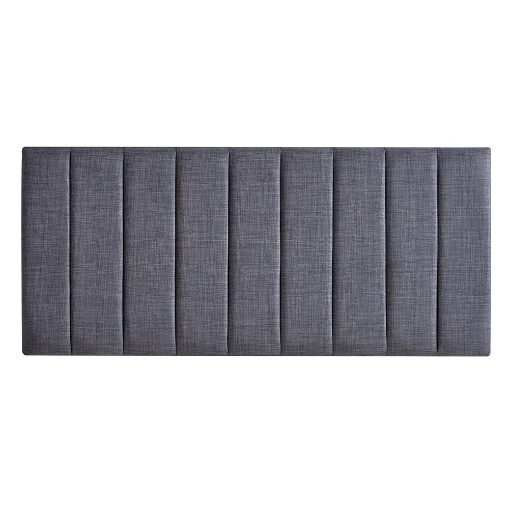 Vertically striped headboard om a white background