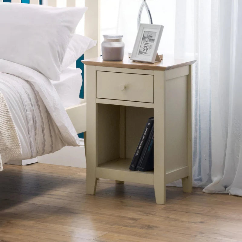 Small wooden side table with a drawer on a white background