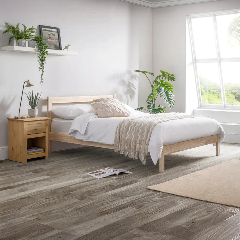 Wooden bed frame on a white background