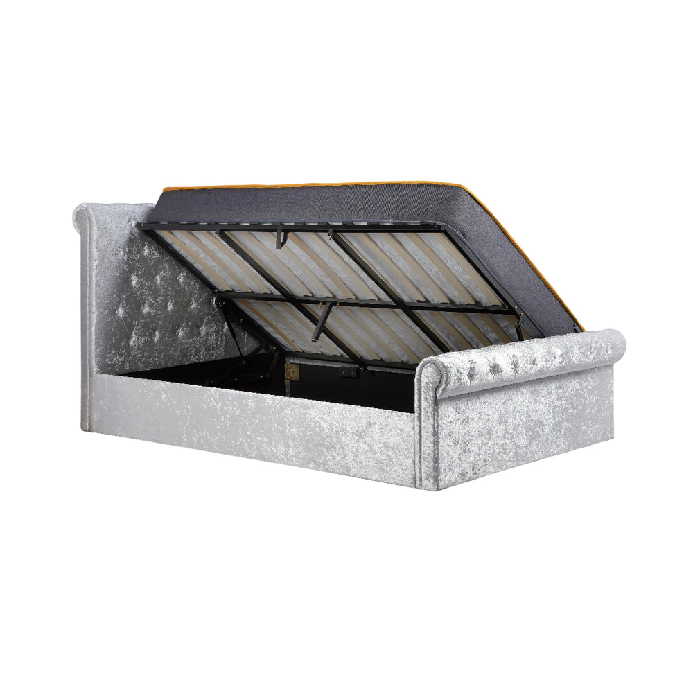 Silver glittery bed frame with open storage compartment on a white background