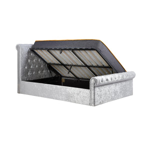 Silver glittery bed frame with open storage compartment on a white background