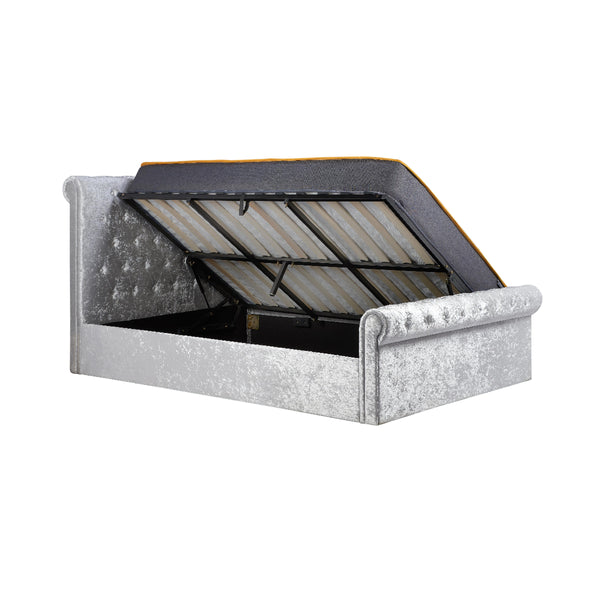 Silver glittery bed frame with open storage compartment on a white background
