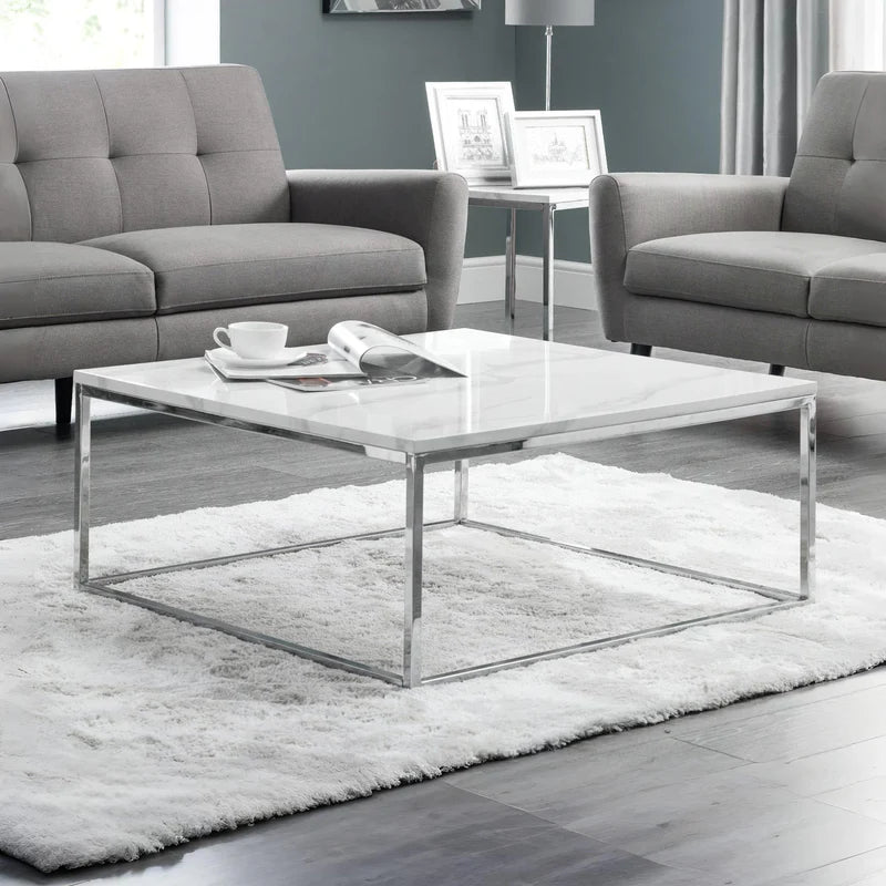 Square white marble coffee table with metal frame on a white background