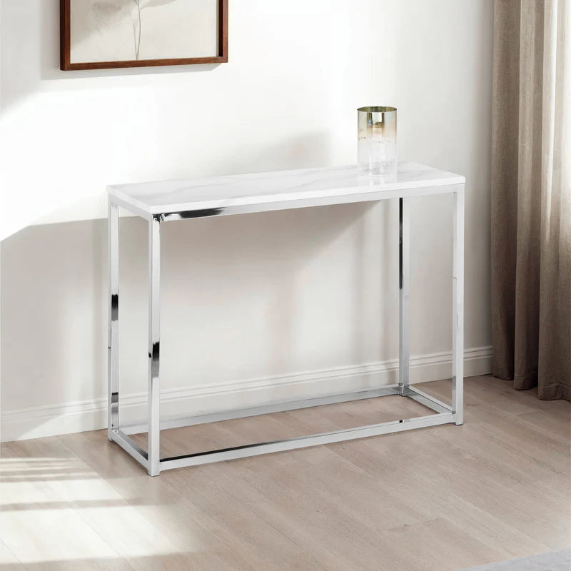 White marble console table with a glass top on a white background