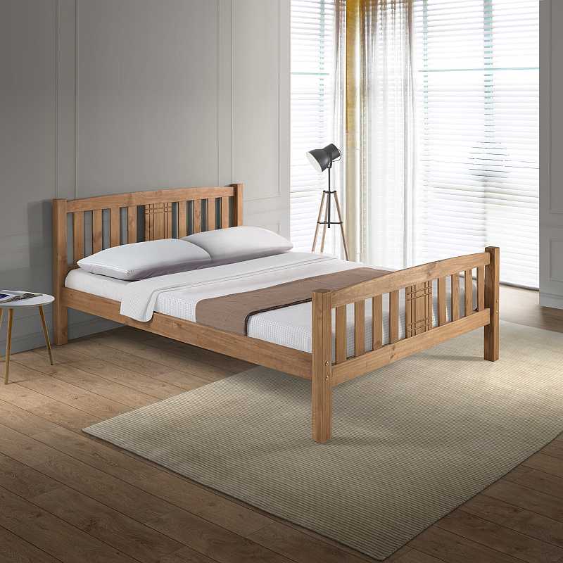 Wooden bed frame on a white background