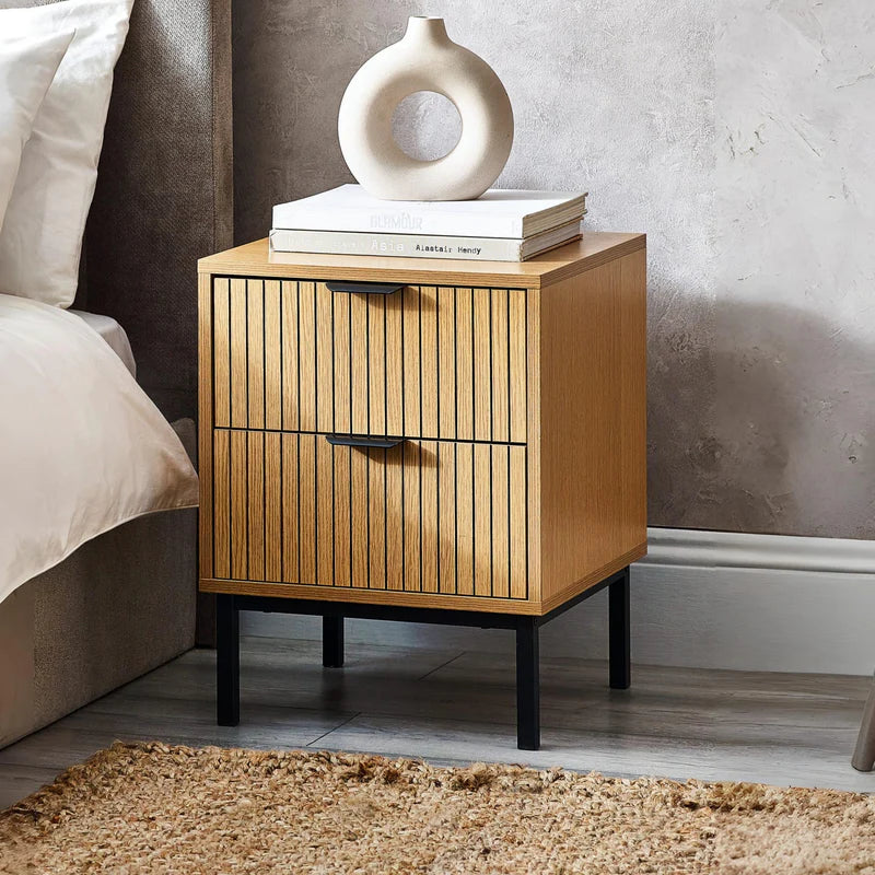 Wooden side table with two drawers on a white background