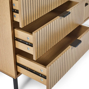 Wooden storage unit with shelves and drawers on a white background